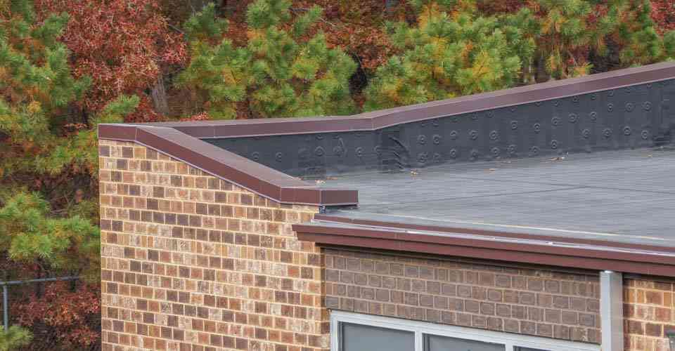 Parapet walls are low protective walls built along the edge of a roof, terrace, balcony, or other structure. In residential and commercial buildings, they play a crucial role in enhancing safety by preventing accidental falls. These walls also provide a clean, finished look to rooftops and can be designed to match the building’s architectural style. Additionally, parapet walls help in shielding the roof from wind uplift and external weather conditions. In some designs, they also serve as support for rooftop equipment or signage. Both functional and decorative, parapet walls are essential components in modern construction.