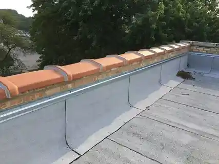 Parapet walls are low protective walls built along the edge of a roof, terrace, balcony, or other structure. In residential and commercial buildings, they play a crucial role in enhancing safety by preventing accidental falls. These walls also provide a clean, finished look to rooftops and can be designed to match the building’s architectural style. Additionally, parapet walls help in shielding the roof from wind uplift and external weather conditions. In some designs, they also serve as support for rooftop equipment or signage. Both functional and decorative, parapet walls are essential components in modern construction.